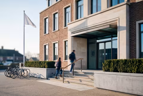 Administration building entrance and steps — Facility / Department / Page imagery.